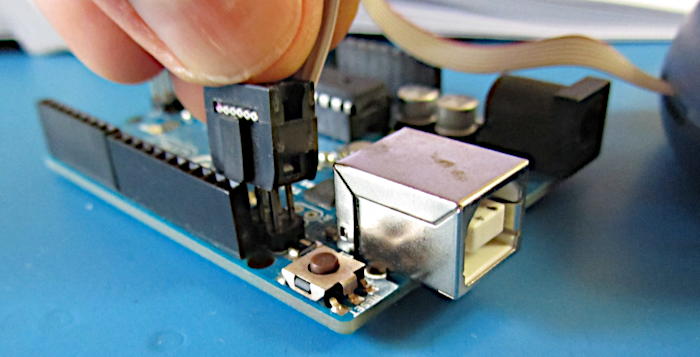 ISP key blocking connection to ICSP header of Arduino Uno as referenced in the Arduino Uno Hardware Manual